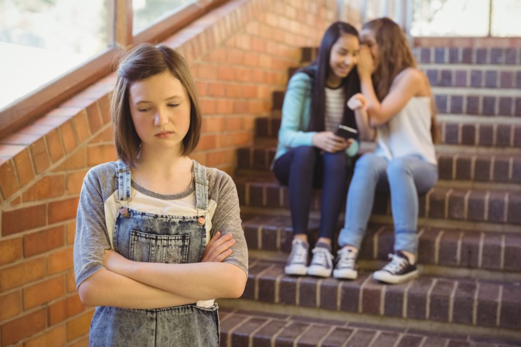 school girls bullying another girl