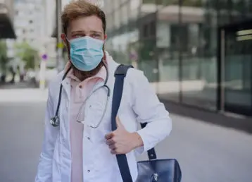 traveling nurse healthcare worker with mask