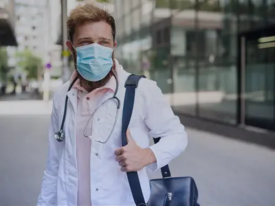 traveling nurse healthcare worker with mask