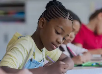 students in class writing