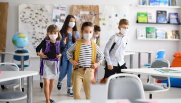 students in classroom wearing face masks