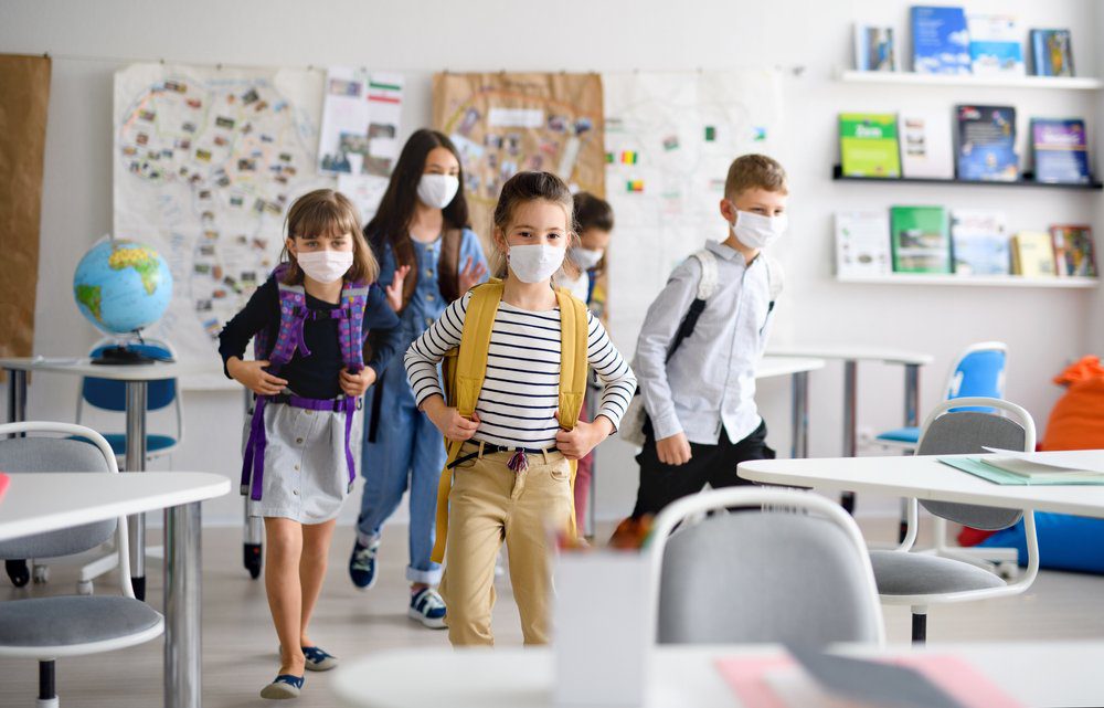 students in classroom wearing face masks