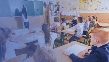 children sitting at desks