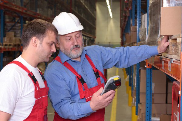 manufacturing-stock elderly workers in factory