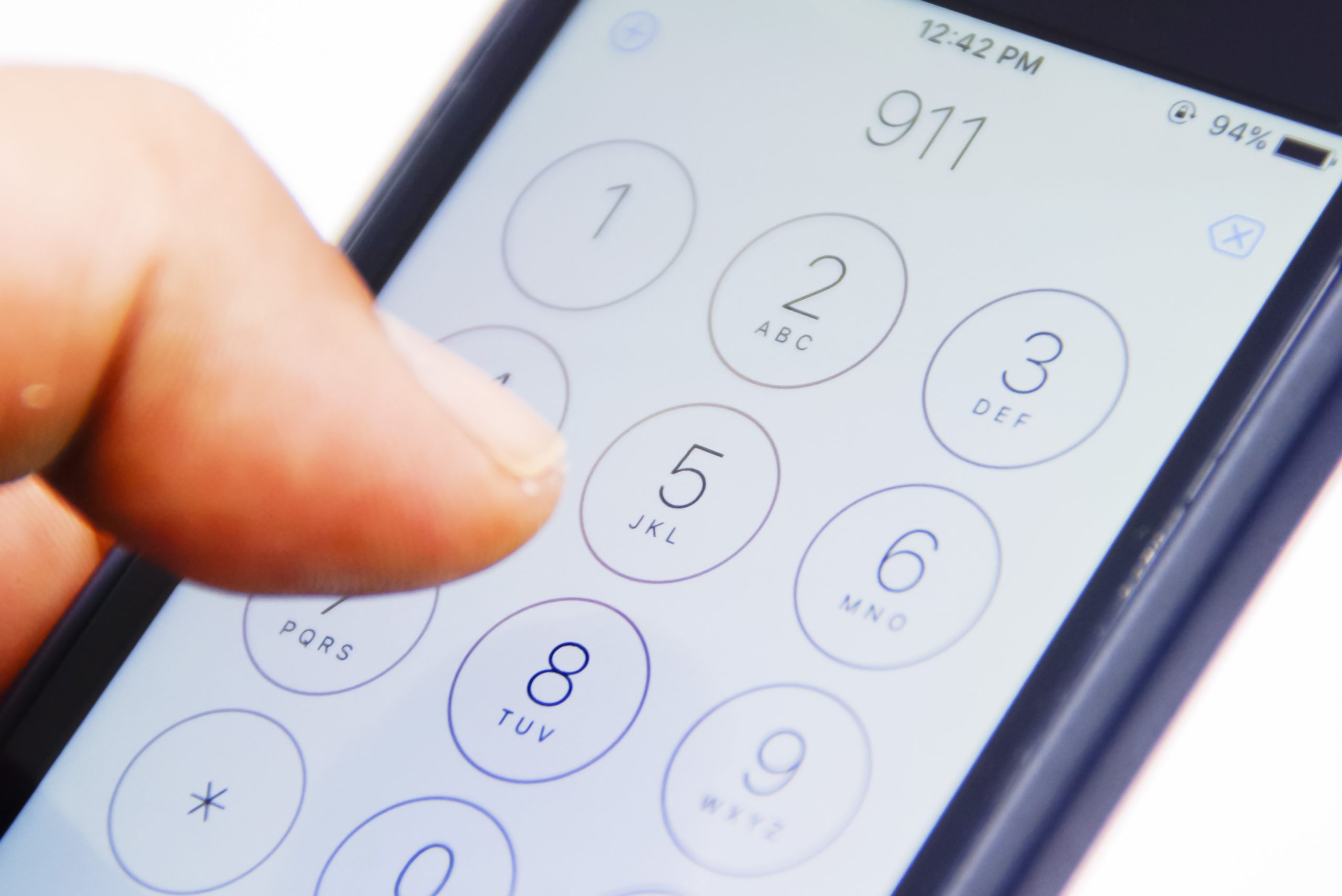911-call-phone-typing-stock-image dialing 911 on cell phone