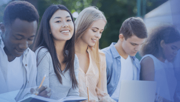 college students sitting together on campus