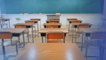 empty classroom with desks