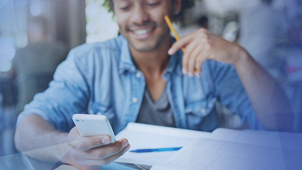 college student looking at phone