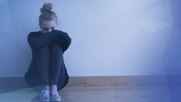 student sitting alone