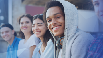 students sitting together smiling 