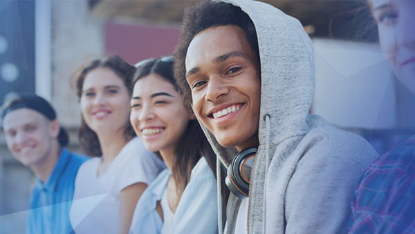 students sitting together smiling