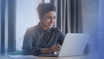 woman-working-smiling-computer-feature