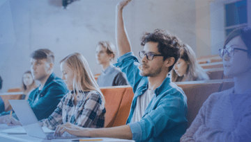 college student hand raised in class