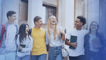 college students walking laughing