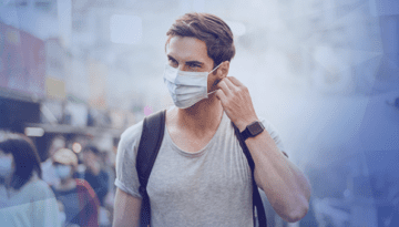 man-wearing-mask-walking-feature