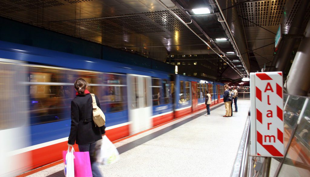 fast moving train at a railway station