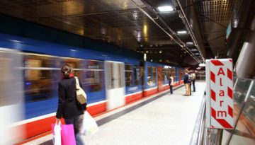 fast moving train at a railway station