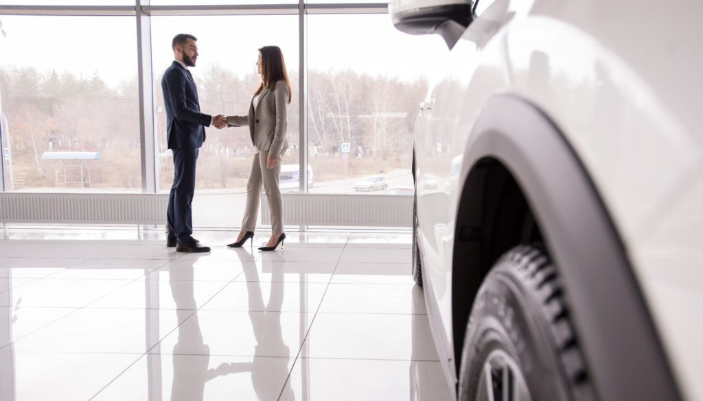 car-dealership-shaking-hands