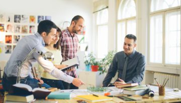 Start Up Business Group of Young employees At Office