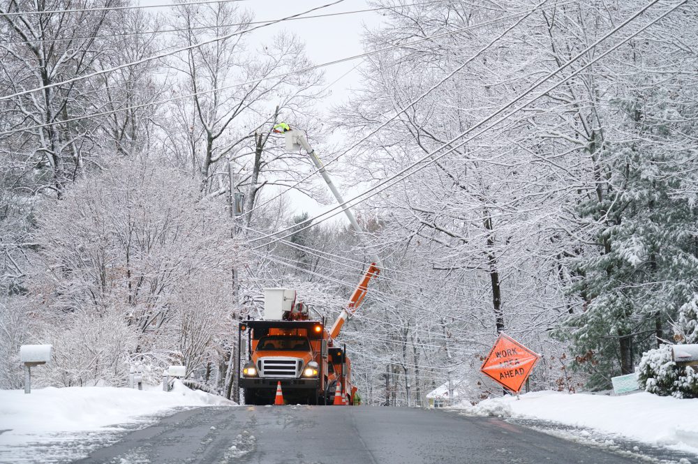 utility worker in the snow