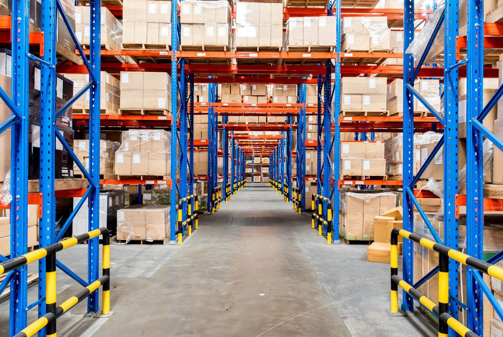 warehousing with shelves full of boxes