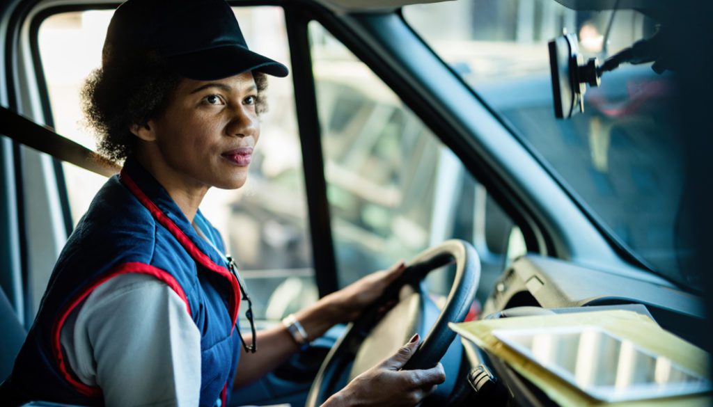 lone worker woman driving transportation delivery truck