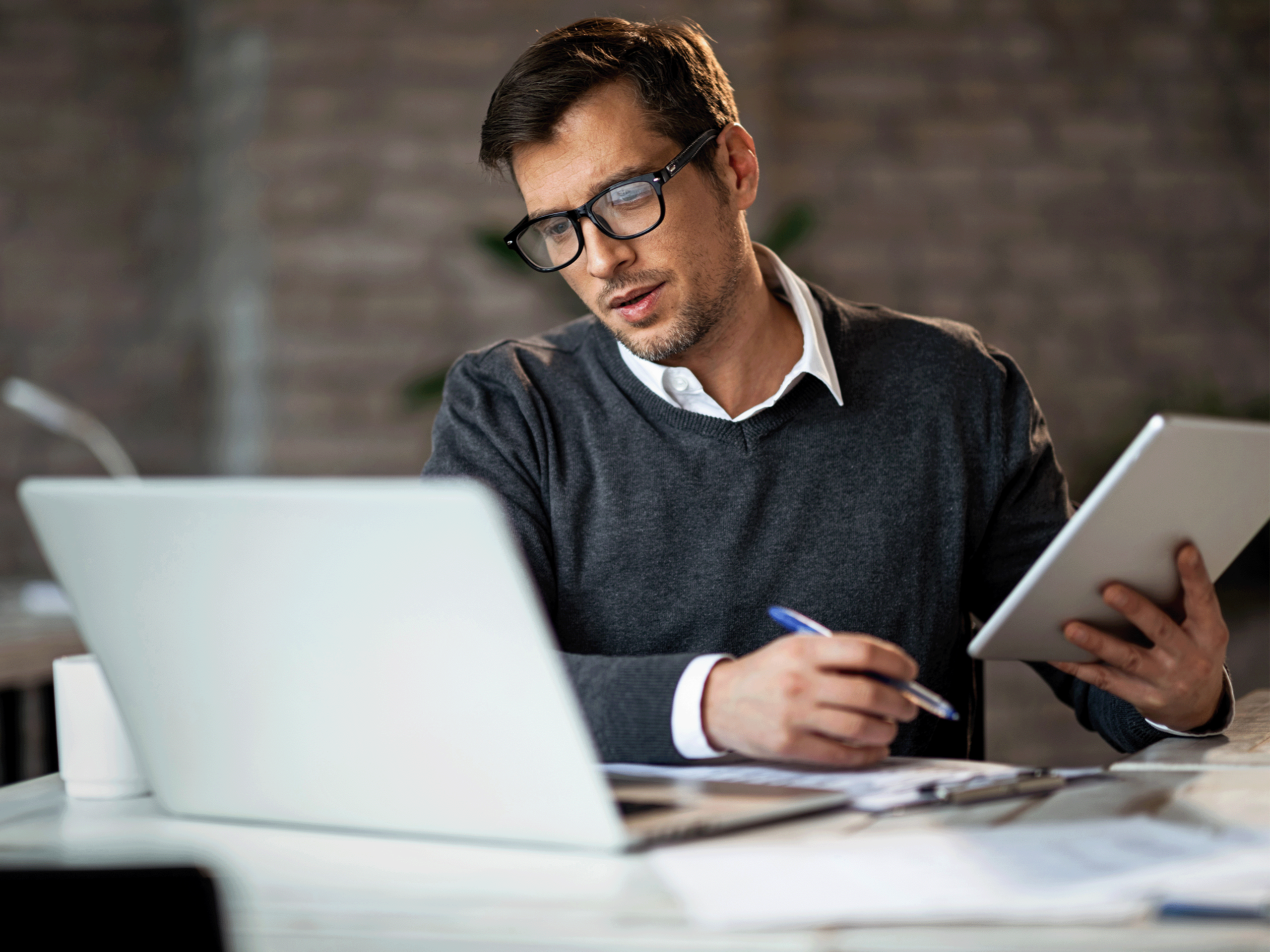 business continuity man working at computer