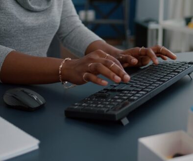 cybersecurity safety plans typing on keyboard