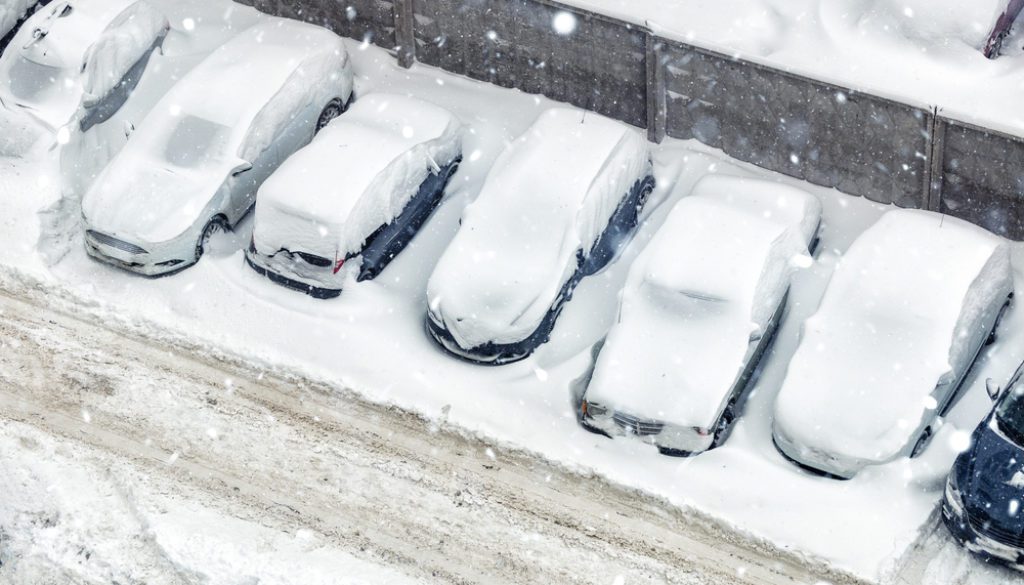 severe weather safety plans snow covered cars in parking lot