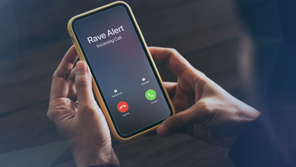mobile-reach-rave-alert-iphone hands holding iPhone with rave alert calling on screen