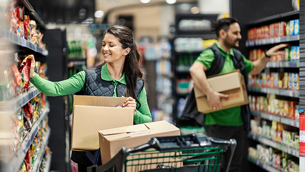 employees stocking shelves at a store