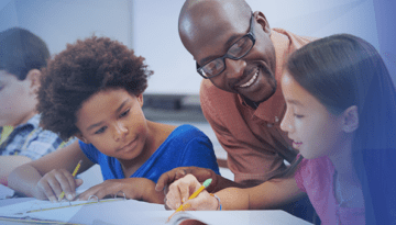 kids in a classroom learning from teacher