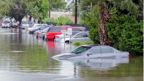 car submerged in floodwater