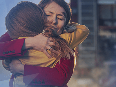 parent and student hugging