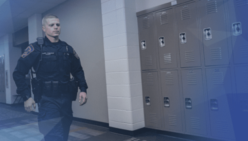 school safety officer walking hallway