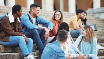 college students sitting together talking