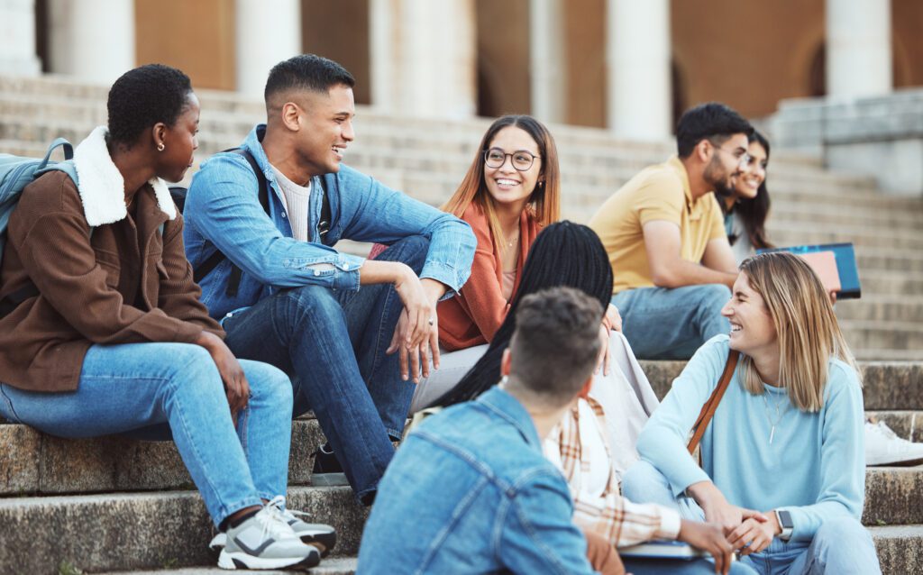 college students sitting together talking